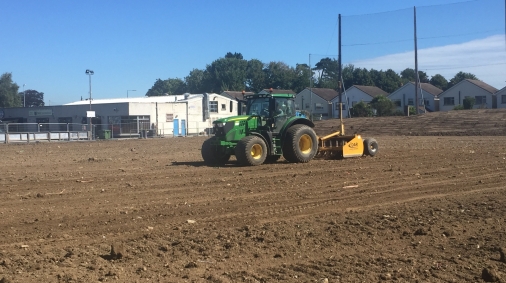 Topsoil laser grading